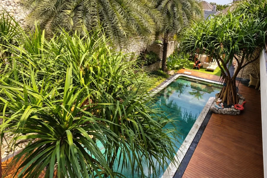 Exterior overview of a four-bedroom freehold family villa with large pool in Bumbak, Umalas, Bali