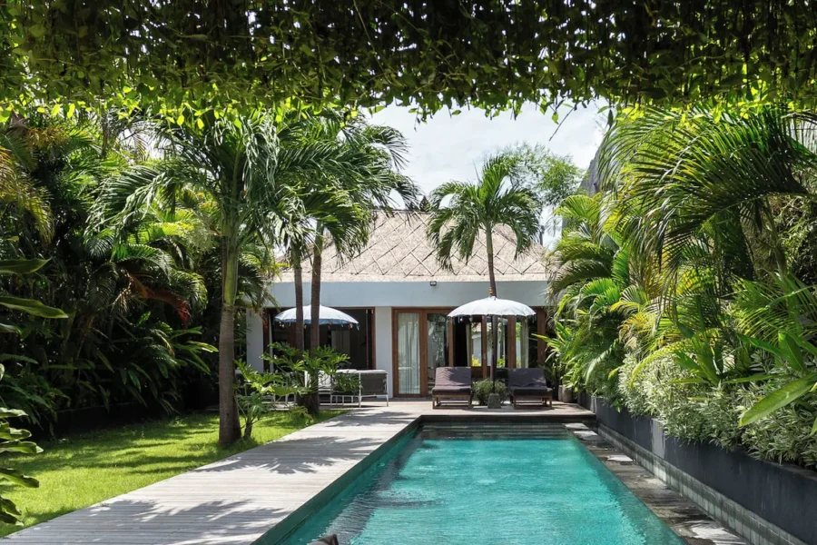 Exterior overview of a three-bedroom tropical villa with private pool and garden in Umalas, Bali