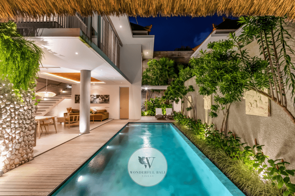 Swan Satu – Night aerial overview of freehold ocean view villa near Batu Belig Beach – Seminyak, Bali