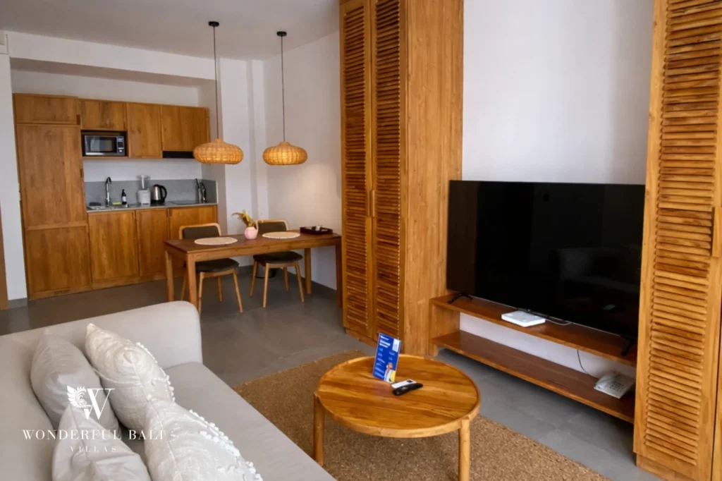 Open-plan living room, kitchen and dining area, 1-bedroom modern studio apartment in Canggu, Bali