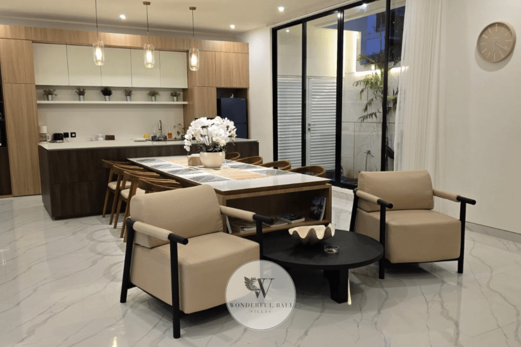 Villa Toku – Bright living and dining room with floor-to-ceiling windows and garden outlook – Petitenget, Seminyak Bali