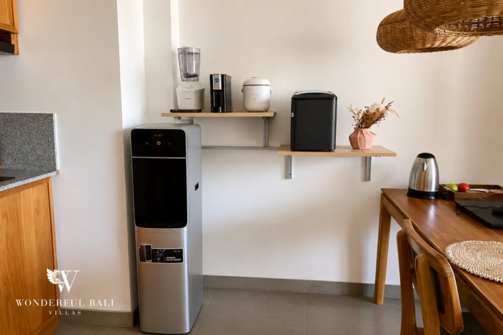 Kitchenette counter with cooktop and appliances, 1-bedroom modern studio apartment in Canggu, Bali