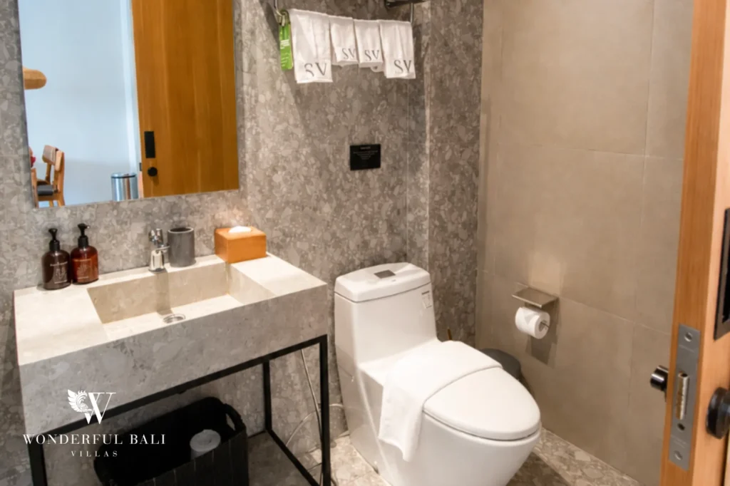 Bathroom with vanity and toilet, 1-bedroom modern studio apartment in Canggu, Bali