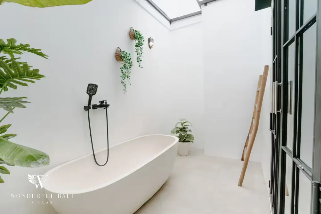 Primary ensuite bathroom with soaking bathtub, modern villa in Ungasan, Bukit