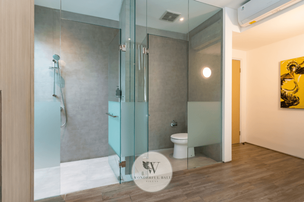 Swan Tiga – Contemporary shower and toilet bathroom with stone finishes – Seminyak, Bali