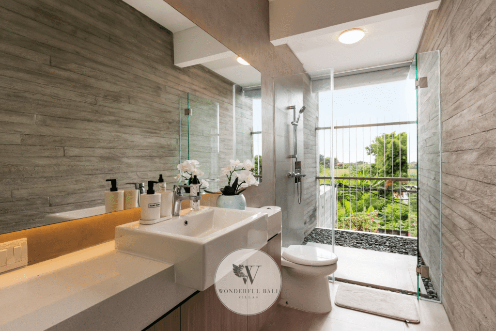 Swan Tiga – Luxury open-air shower with spectacular ocean view backdrop – Seminyak, Bali