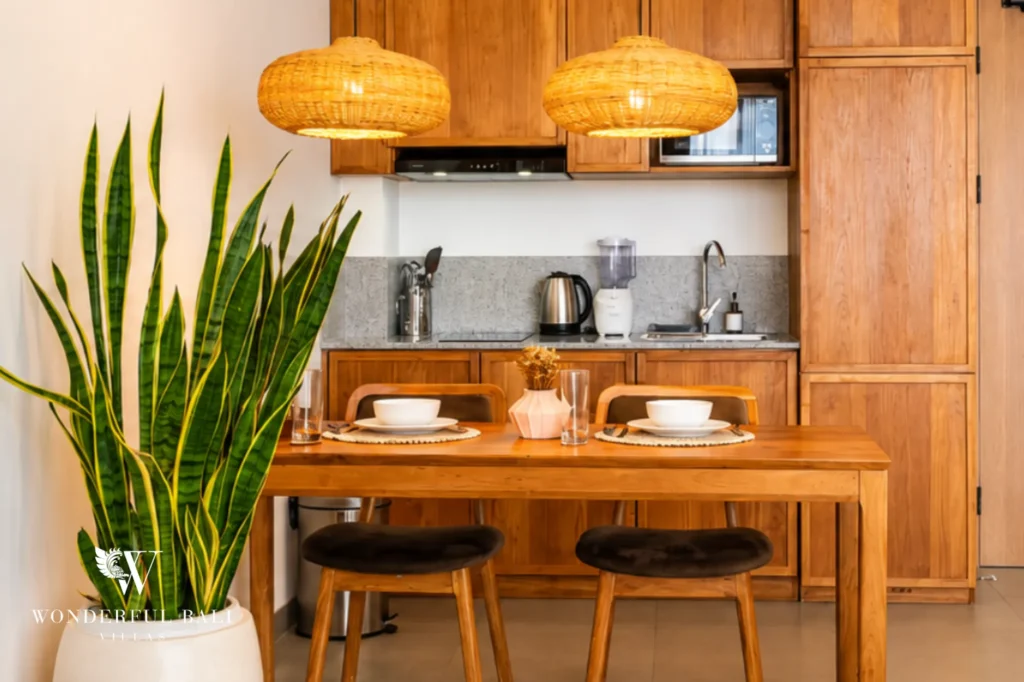 Dining area with pendant lights and seating, 1-bedroom modern studio apartment in Canggu, Bali