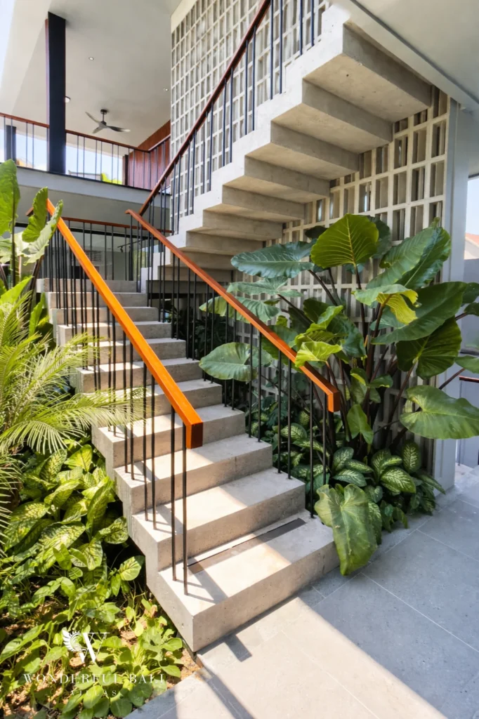 Outdoor stairs linking ground and upper floor, four-bedroom villa Pererenan