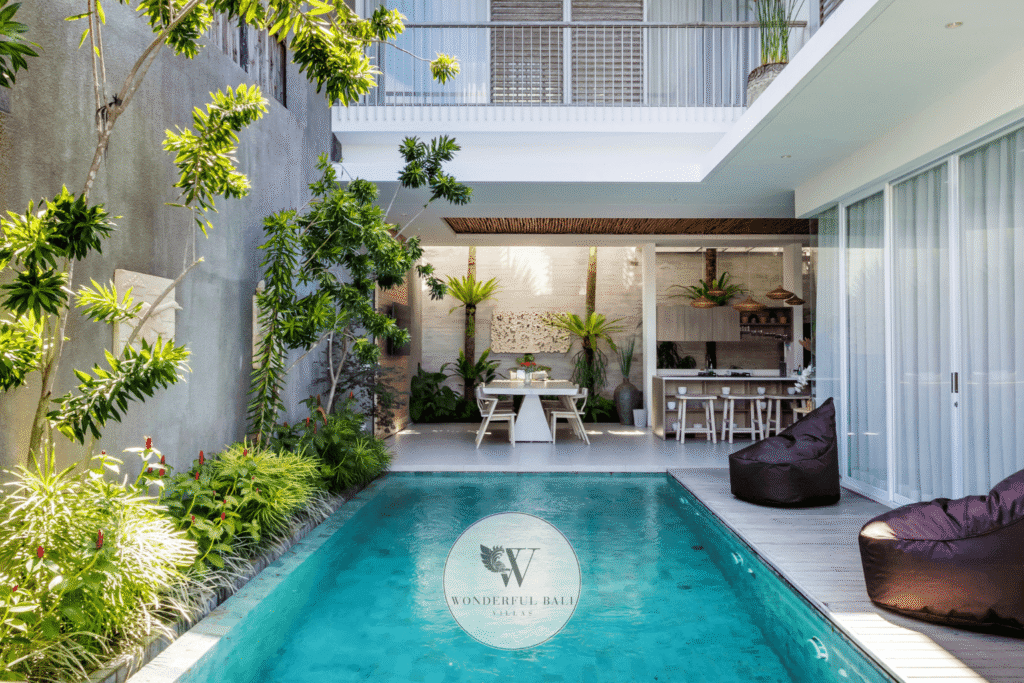 Swan Tiga – Private pool area with sun loungers and panoramic ocean views – Seminyak, Bali