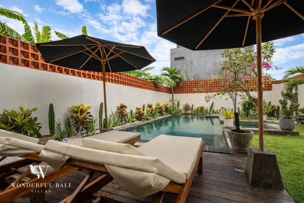 monthly villa rental umalas — pool deck with sun loungers
