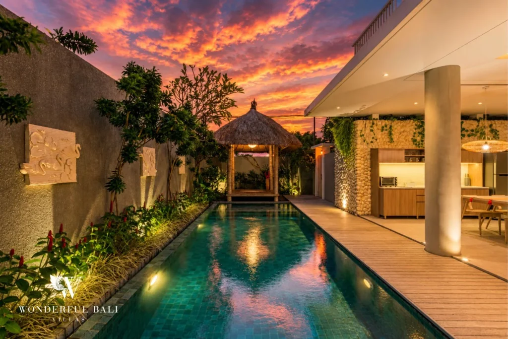 Private pool and bale at sunset at a villa in Petitenget, Bali