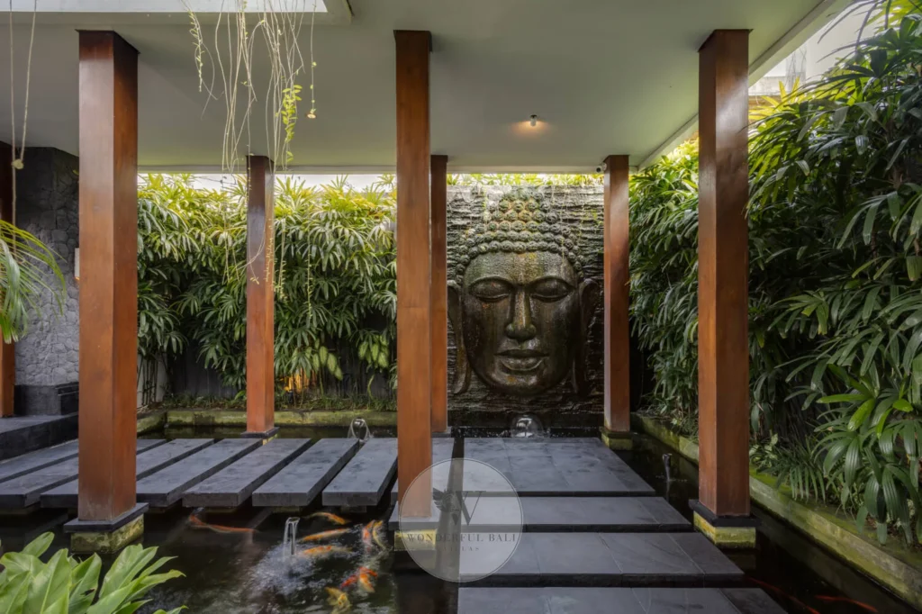 Covered outdoor corridor linking the wings of a single-storey Canggu villa