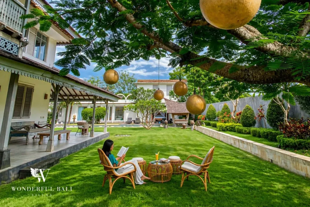 Outdoor reading nook in the garden with hanging lantern balls, Villa Hasian in Jimbaran
