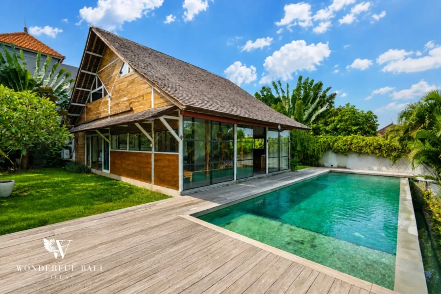 Large pool and wide timber deck fronting the A-frame timber villa, 4-bedroom dual-villa compound for sale in Pererenan
