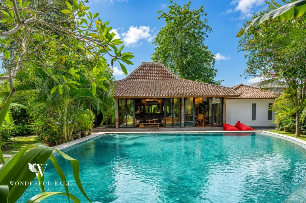 Aerial overview of pool, joglo roof and tropical garden, 4-bedroom villa in Umalas