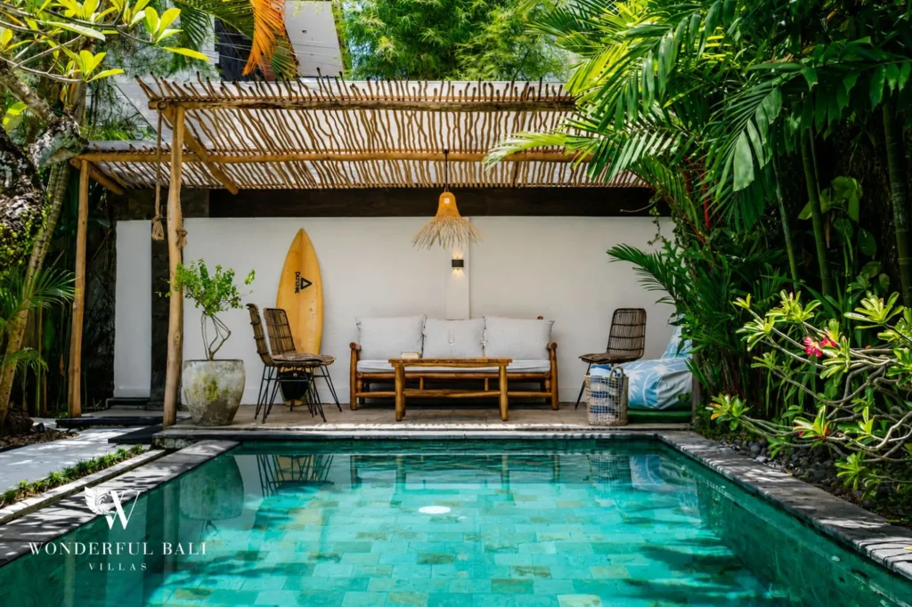 View across the pool to the outdoor bale and garden, 4-bedroom family villa in Berawa, Canggu