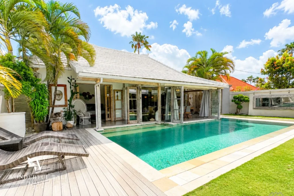 Pool deck with sun loungers, 4-bedroom family villa in Mertasari, Kerobokan