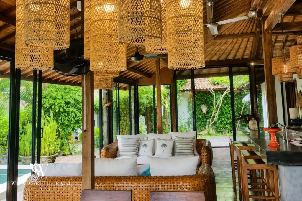 Joglo living room with daybed and traditional finishes, 4-bedroom villa in Umalas