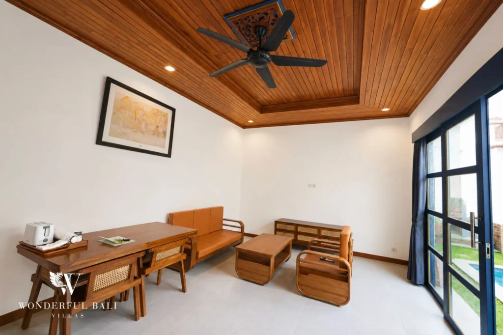 Living and dining area under a wooden ceiling, 2-bedroom villa in Sanur