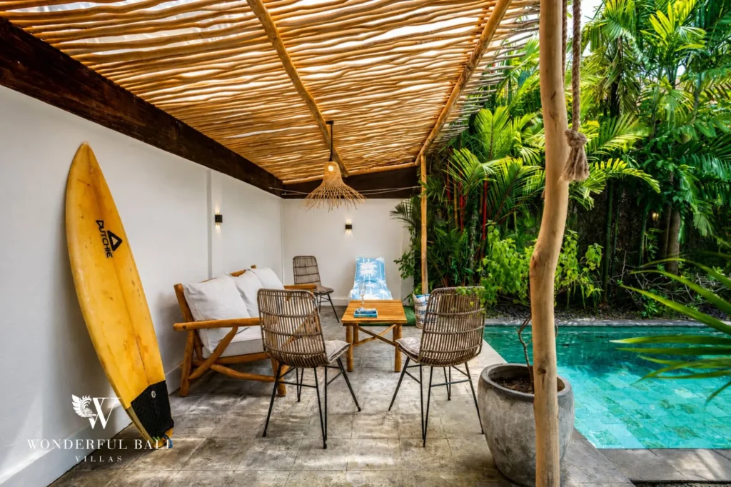 Private pool with outdoor living area and sun loungers, 4-bedroom family villa in Berawa, Canggu