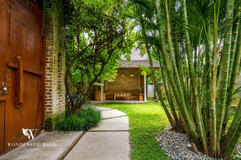 Garden pathway through tropical planting, 4-bedroom dual-villa compound in Pererenan