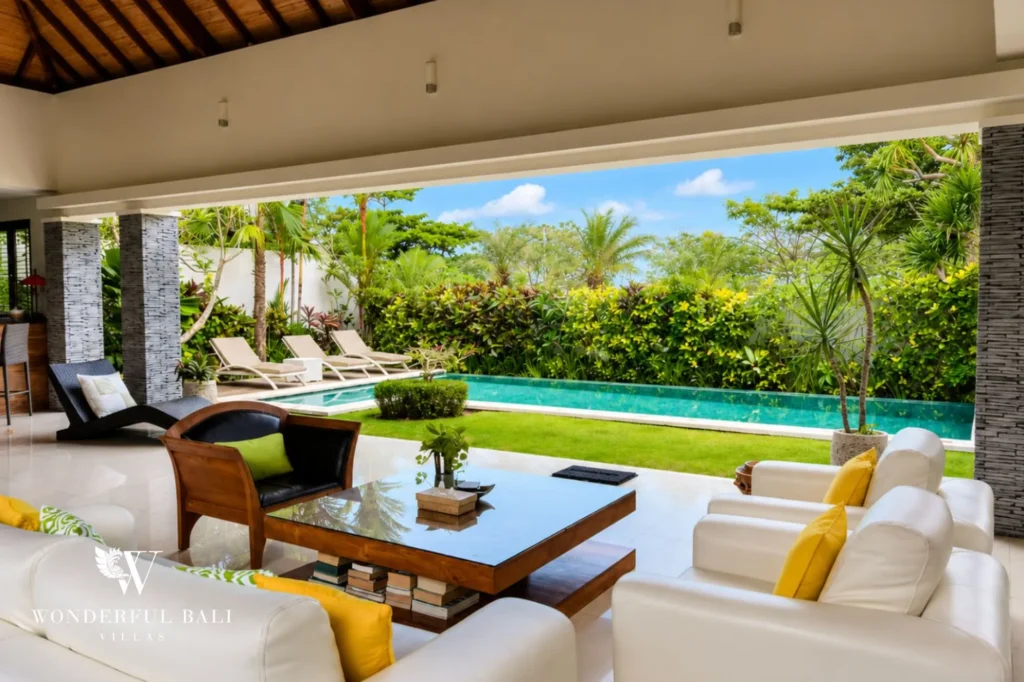 Living room with sofa and pool view, 5-bedroom villa in Batu Bolong, Canggu