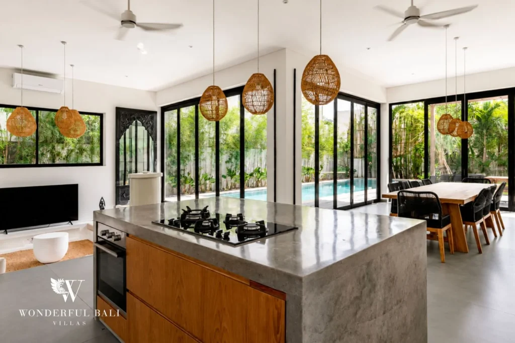 Open-plan kitchen and dining with pool view at Luxury 3BR Villa in Pererenan, Bali