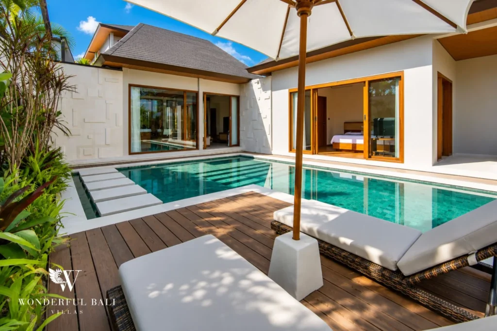 Pool with direct bedroom access and sunloungers in Tumbak Bayuh, Bali