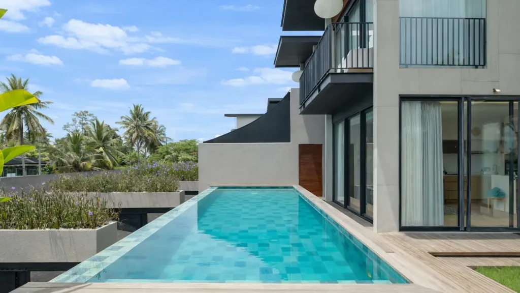 Villa Umahan, Ubud — pool, alongside the villa with sliding doors to the bedroom, Villa Umahan
