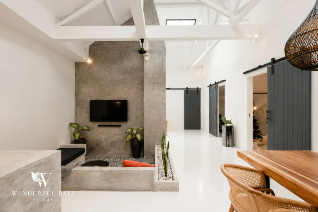 Living area with a concrete feature wall, 2-bedroom villa in Canggu