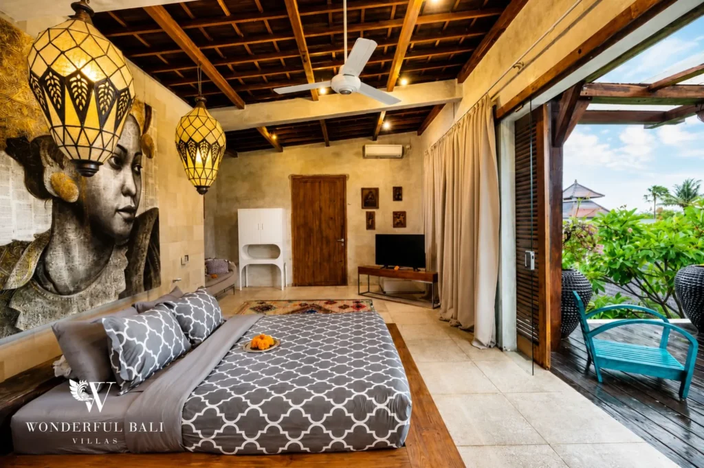 Enclosed living room with large couch and natural materials, 4-bedroom villa in Petitenget, Seminyak