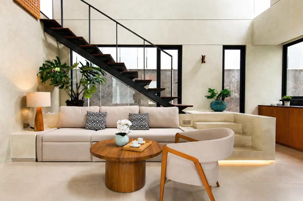Living room from a second angle showing sliding doors and natural light, Villa Umahan Sanur