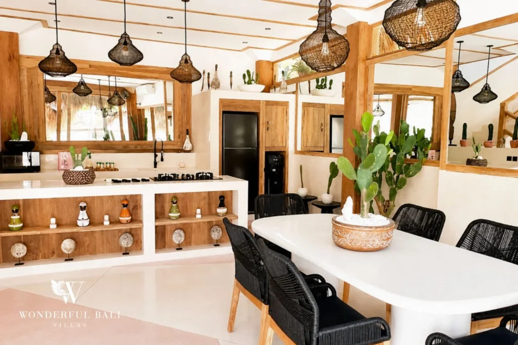 Open kitchen and dining with rattan pendants in Berawa, Bali