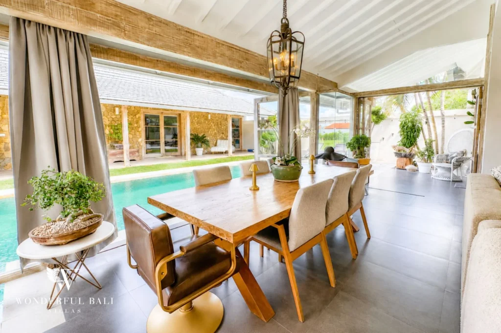 Patio dining table with chairs in the garden, 4-bedroom family villa in Mertasari, Kerobokan