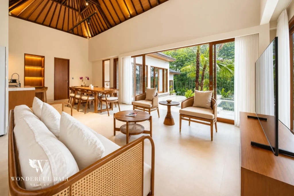 Pavilion-style living and dining with high alang-alang ceiling in Tumbak Bayuh, Bali