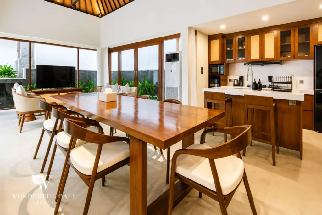 Open-plan dining and kitchen with timber accents in Tumbak Bayuh, Bali