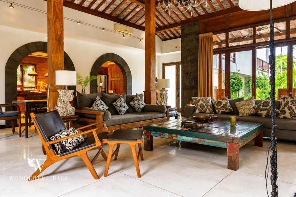 Open-plan living area opening onto the pool deck, 4-bedroom villa in Berawa, Canggu