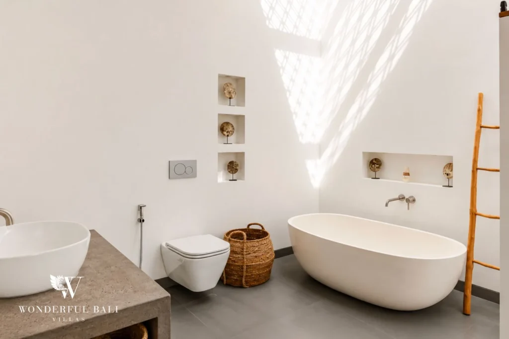 Master bathroom with freestanding bathtub and skylight at Luxury 3BR Villa in Pererenan, Bali