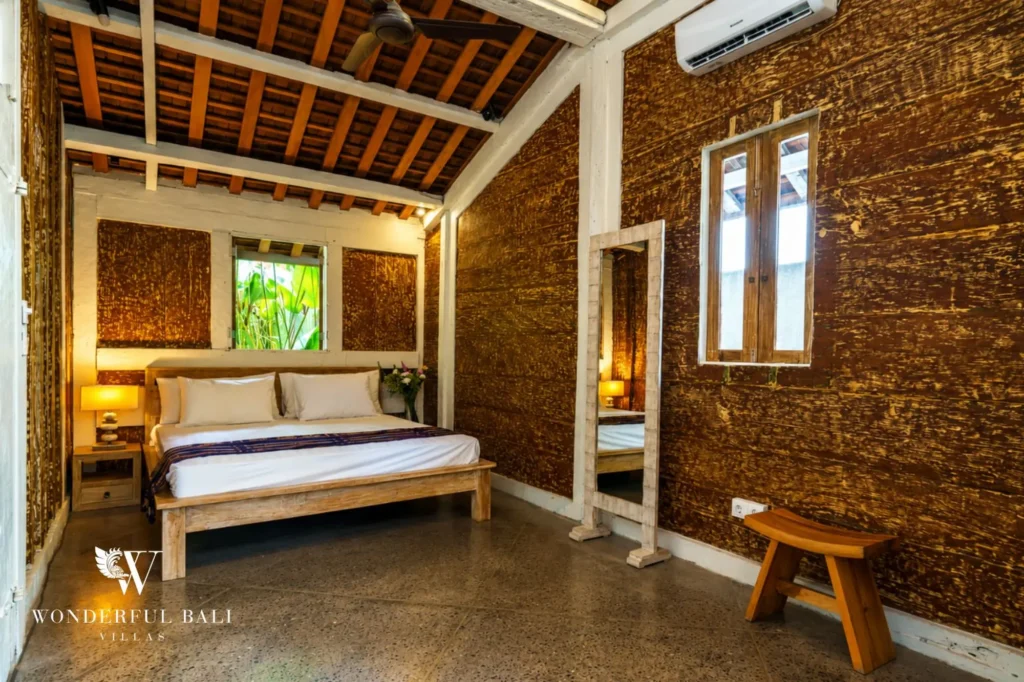 Open-air bathroom with freestanding bathtub and garden light, dual-villa compound in Pererenan