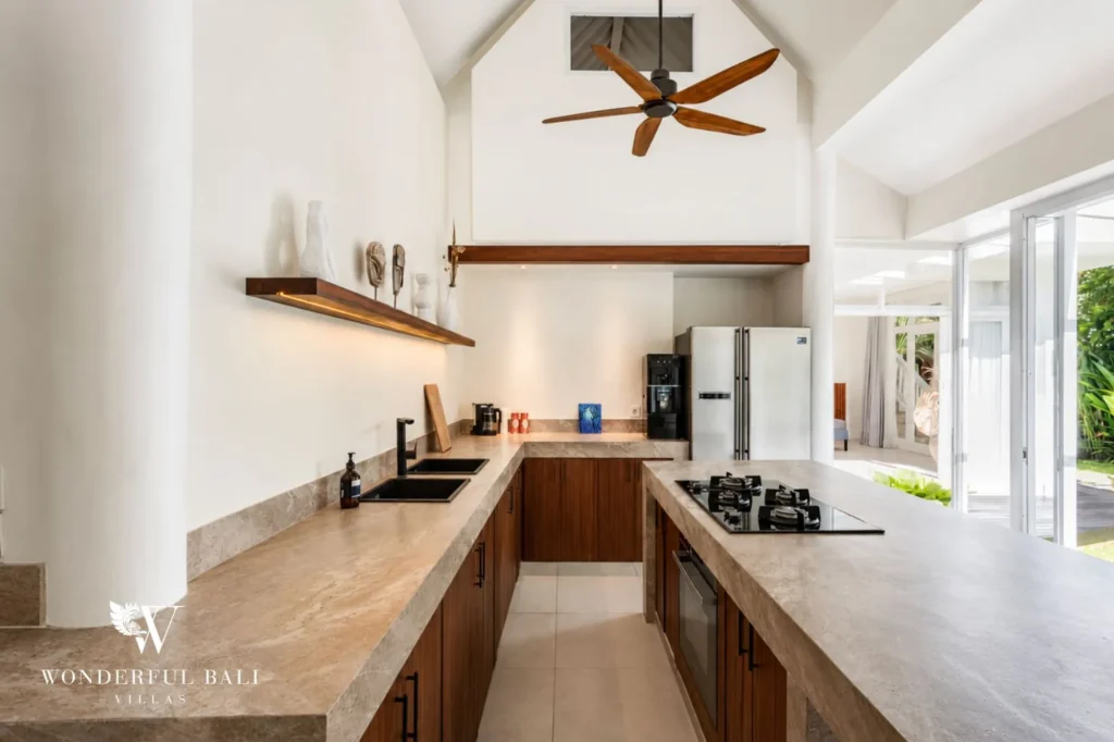 Kitchen layout with staircase to upper floor, 4-bedroom family villa in Berawa, Canggu