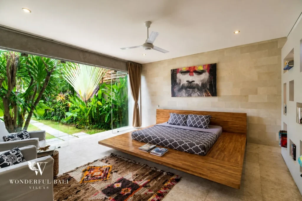 Master bedroom with traditional Balinese decor and natural materials, 4-bedroom villa in Petitenget, Seminyak