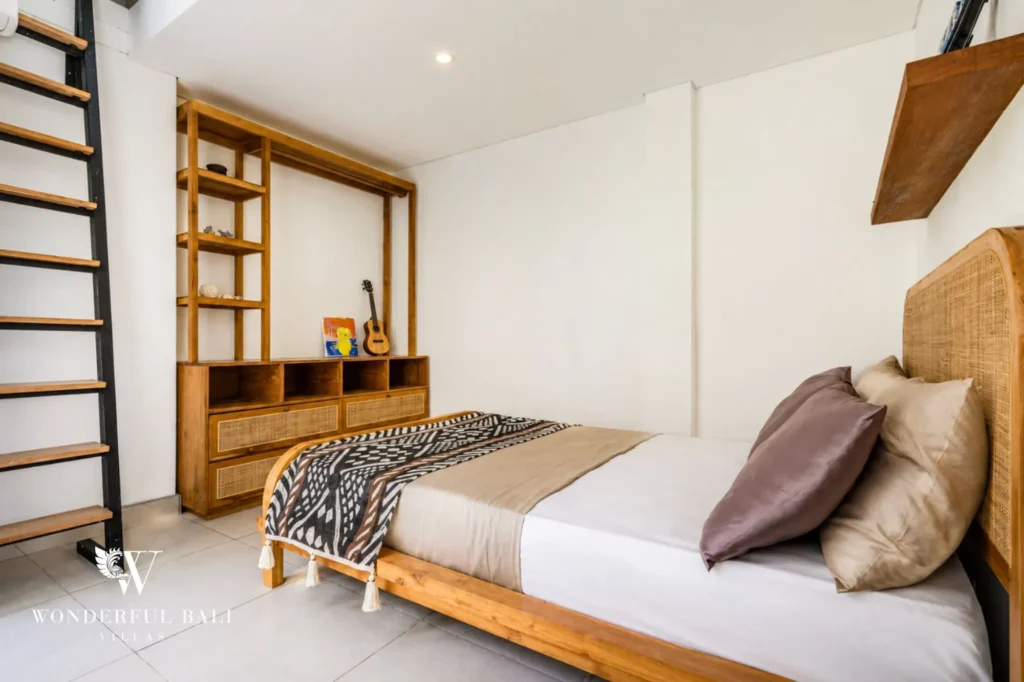 Wooden staircase connecting the two floors, 4-bedroom family villa in Berawa, Canggu