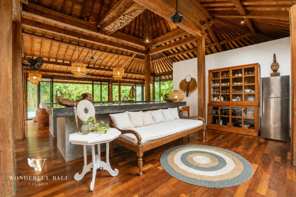 Bedroom with traditional antique decor, 4-bedroom joglo villa in Umalas