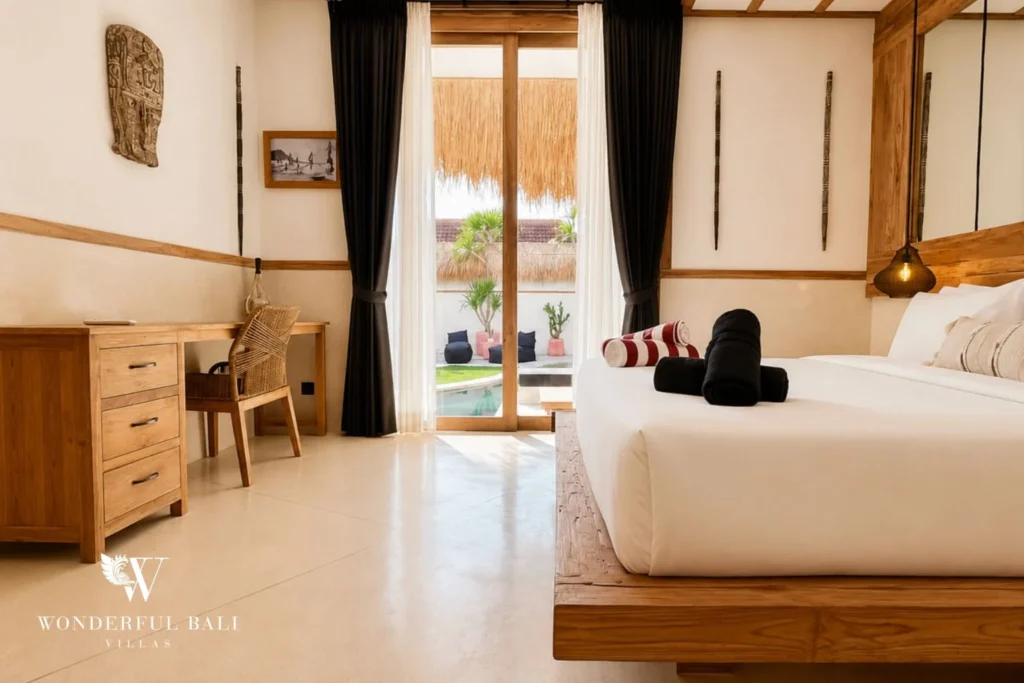 Bedroom with desk and direct pool view in Berawa, Bali