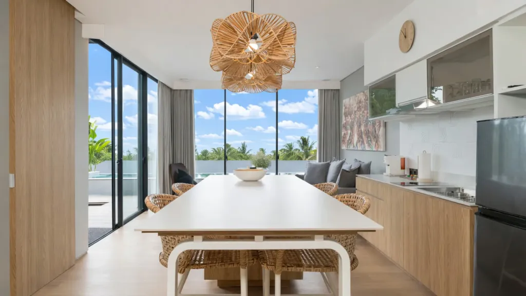 Villa Umahan, Ubud — dining, table for six with rattan pendant and pool view, Villa Umahan