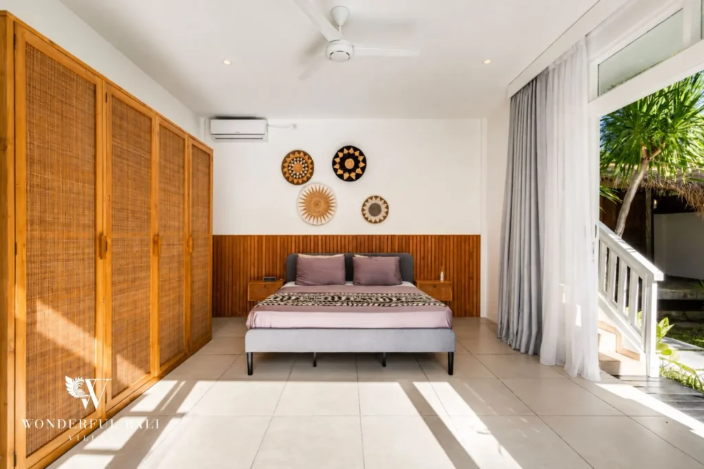 Bedroom with wooden cabinetry and natural materials, 4-bedroom family villa in Berawa, Canggu