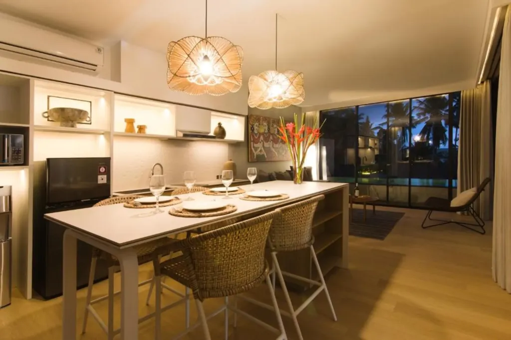 Villa Umahan, Ubud — dining, set for the evening with rattan pendants over the table, Villa Umahan