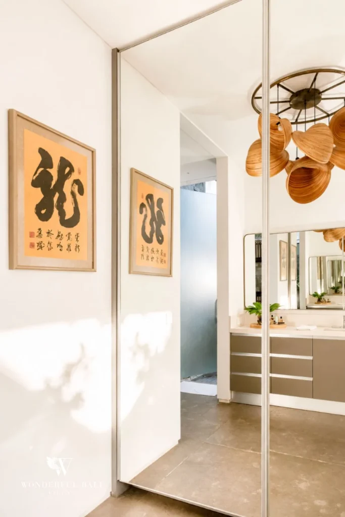 monthly villa rental Umalas — entry corridor asian art