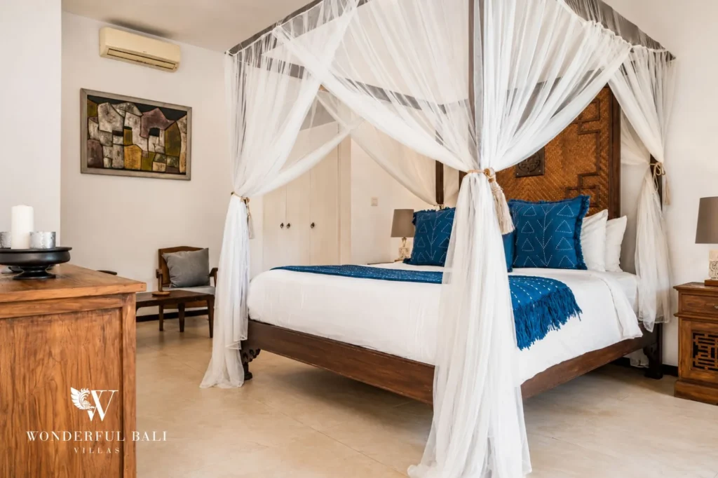 Bedroom with traditional four-poster bed, 4-bedroom villa in Berawa, Canggu