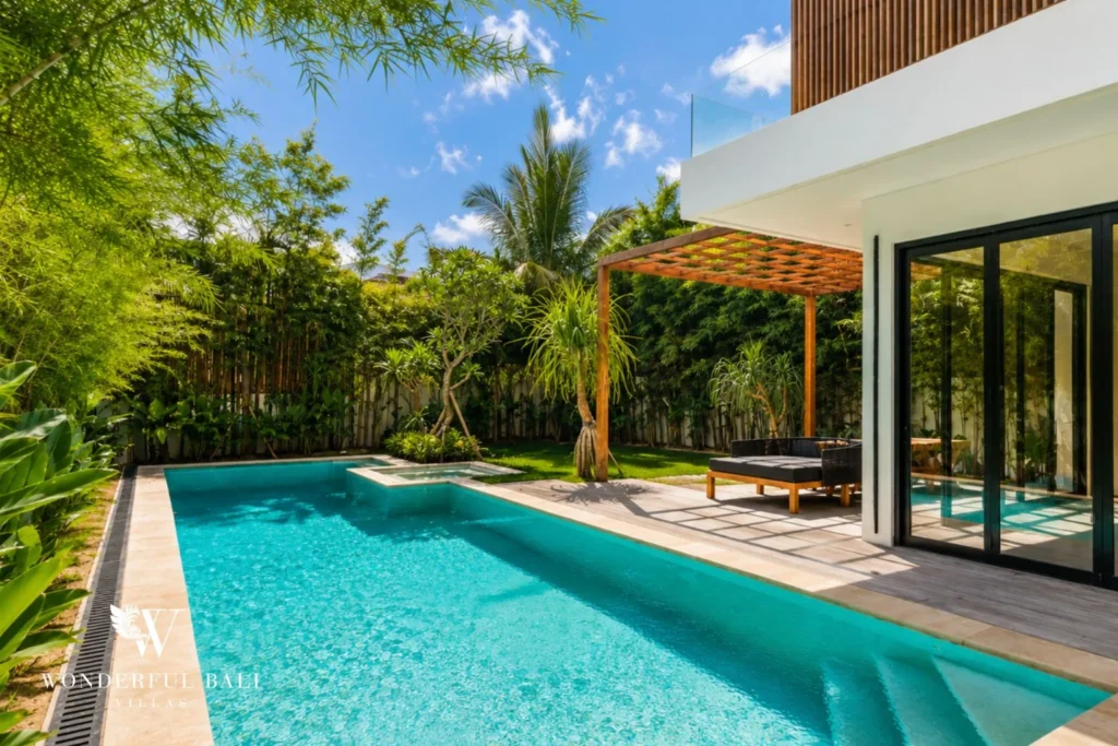 Pool with pergola, daybed and bamboo garden at Luxury 3BR Villa in Pererenan, Bali